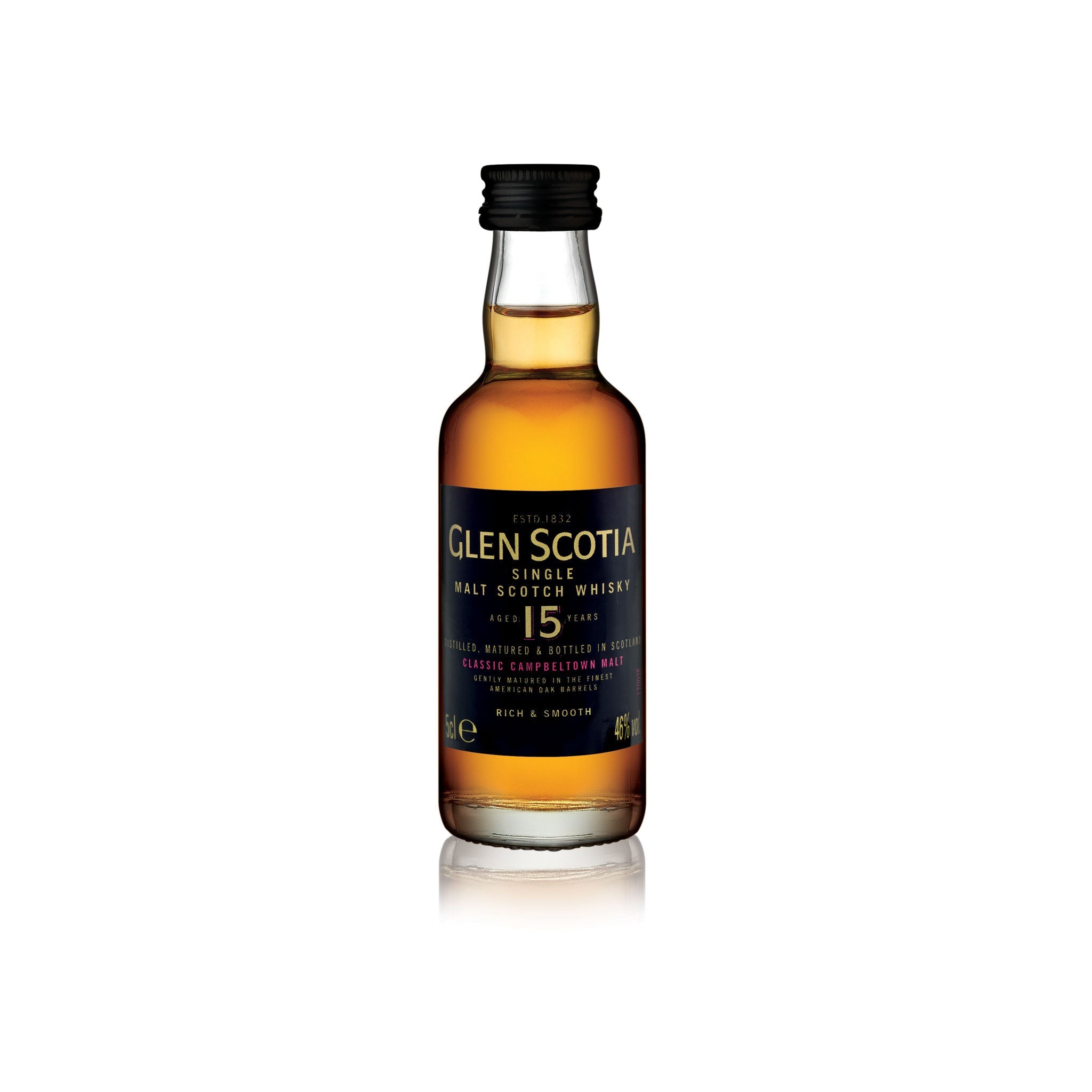 A small 5cl bottle of Glen Scotia 15 Year Old Whisky Miniature. The mini bottle features a black cap and label adorned with gold and white text showcasing the whisky's details. This amber-colored spirit is 46% ABV and described as "rich & smooth." It's an impeccable gift for any whisky connoisseur.